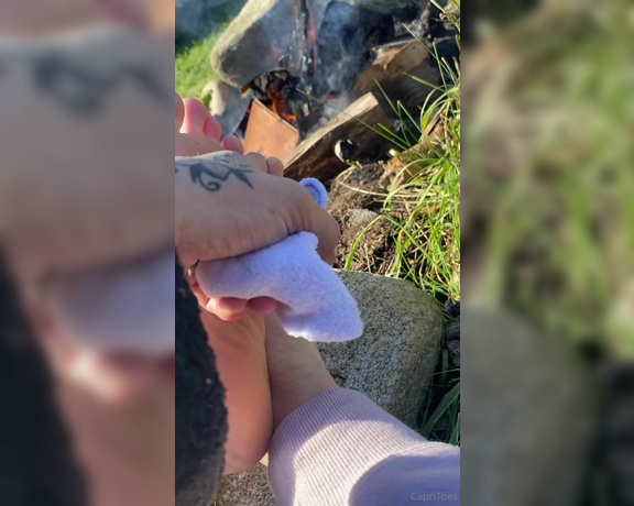 Capri aka Capritoes OnlyFans - Look how cute my feet are warming up by the fire then jerk off to my soles here Camping JOI 1