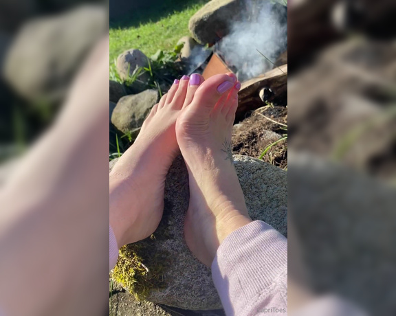 Capri aka Capritoes OnlyFans - Look how cute my feet are warming up by the fire then jerk off to my soles here Camping JOI 1