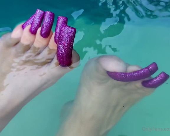 Lora Long Nails aka Loralongnails OnlyFans - Feet in the pool on a summer day When its hot outside, you want to cool off a little by lying