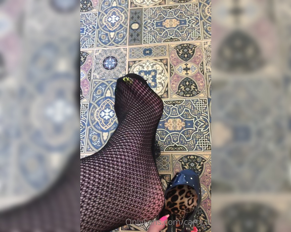 Carty aka Cartyti OnlyFans - Crossed legs in fishnet pantyhose and heels