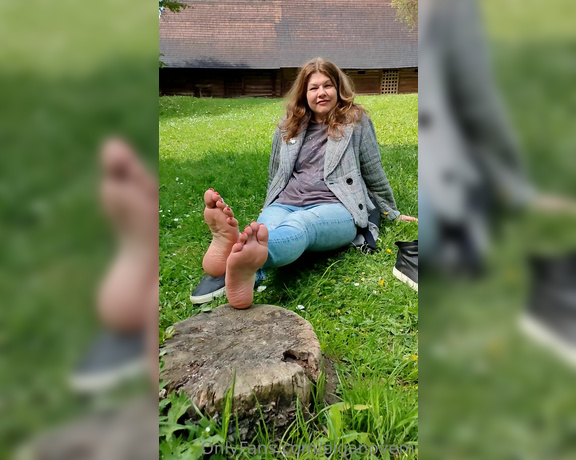 Olga Infinity aka Olganovem OnlyFans - My sweaty feet I air my feet on a stump in a public place (ethno park) 1