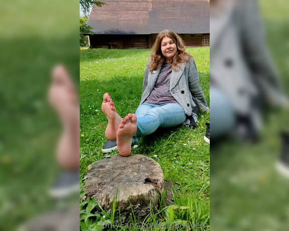 Olga Infinity aka Olganovem OnlyFans - My sweaty feet I air my feet on a stump in a public place (ethno park) 1