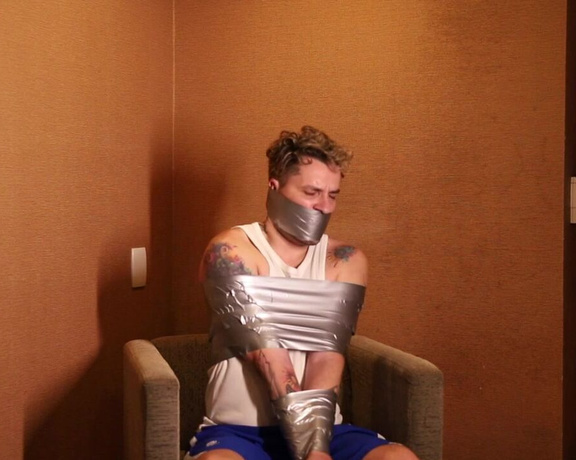 Tonny aka Tape_br OnlyFans - Silver  Episode 3 With arms tightly secured with duct tape, Tony is completely immobilized Model @