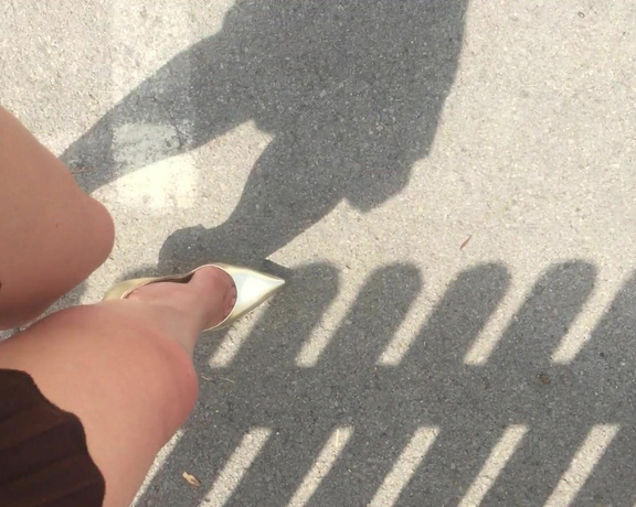 Nikki Whiplash aka Nikkiwhiplash OnlyFans - Video walking outside in the sunshine in my sexy gold Casadei blades and short pleated dress