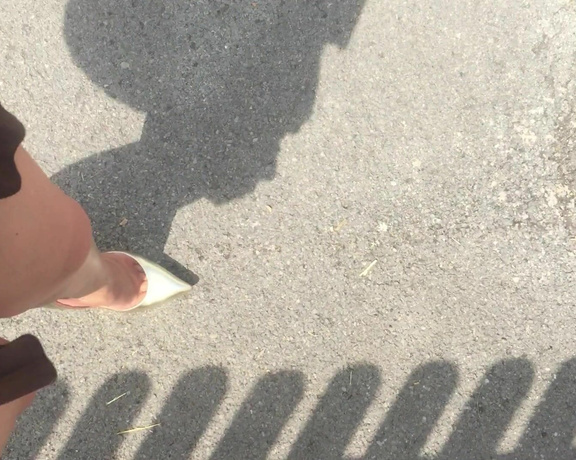 Nikki Whiplash aka Nikkiwhiplash OnlyFans - Video walking outside in the sunshine in my sexy gold Casadei blades and short pleated dress