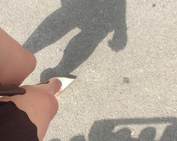 Nikki Whiplash aka Nikkiwhiplash OnlyFans - Video walking outside in the sunshine in my sexy gold Casadei blades and short pleated dress