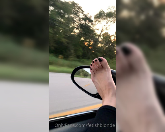 Foot fetish blonde aka fetishblonde OnlyFans - Black pedicure hanging out the window … feeling the wind on my sole