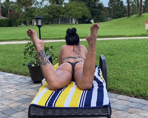 Temptress Raven Eve aka evetemptress OnlyFans - When I layout and ignore you while you watch My ass in the tiny little leather looking black bikini