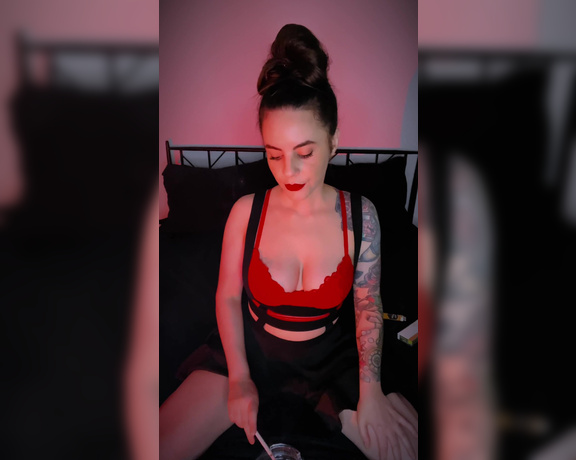 ManyVids - Dani Lynn - Smoking in Red Bra and Black Skirt