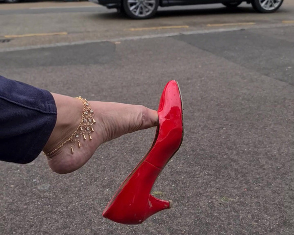 FeetBySherri aka feetbysherri OnlyFans - Dangling on the high street in my red shoes