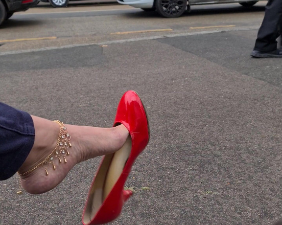 FeetBySherri aka feetbysherri OnlyFans - Dangling on the high street in my red shoes