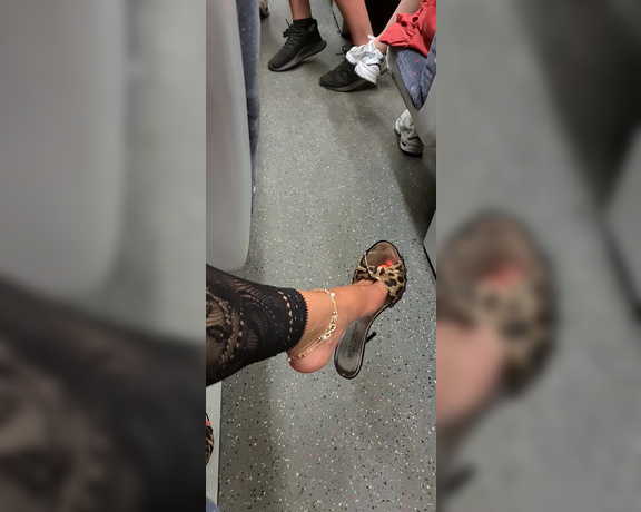 FeetBySherri aka feetbysherri OnlyFans - Shoe dangling on a busy train