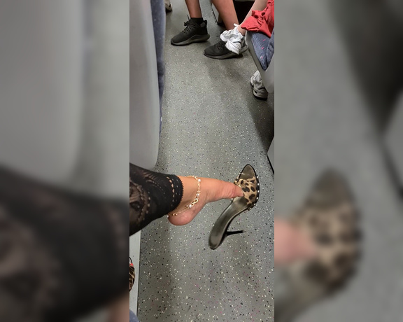 FeetBySherri aka feetbysherri OnlyFans - Shoe dangling on a busy train