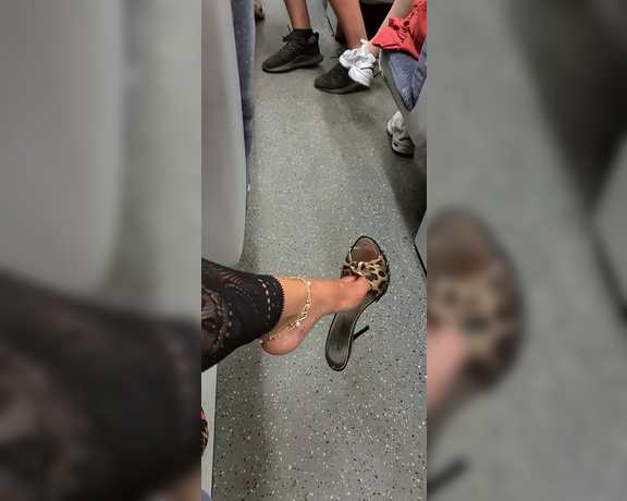 FeetBySherri aka feetbysherri OnlyFans - Shoe dangling on a busy train