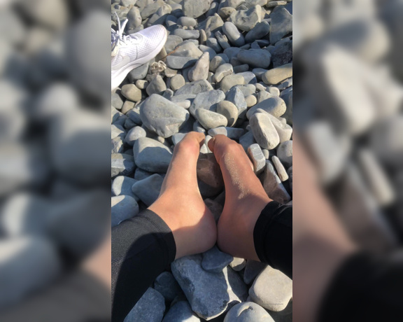 Naughty Nylons aka naughtynylons OnlyFans - Cooling off my hot feet in the breeze, and rubbing them against the rocks! What