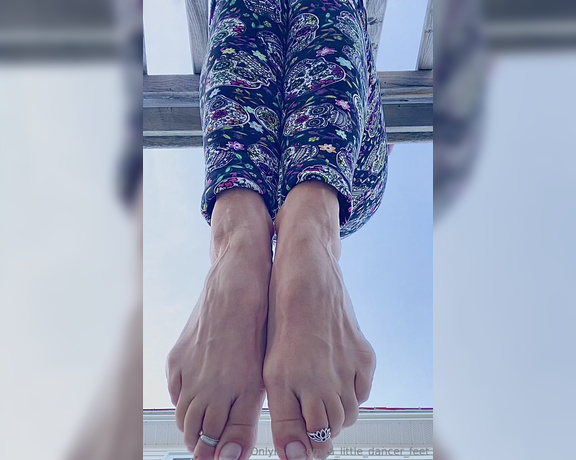 Lezlyan aka la_little_dancer_feet OnlyFans - My feet are just dangling about down by the Oceanside, and let me tell you, its